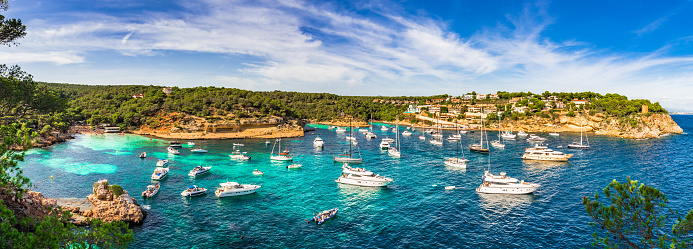 Panorama of mediterranean sea bay with yachts boats at seaside on Majorca, Spain Balearic Islands