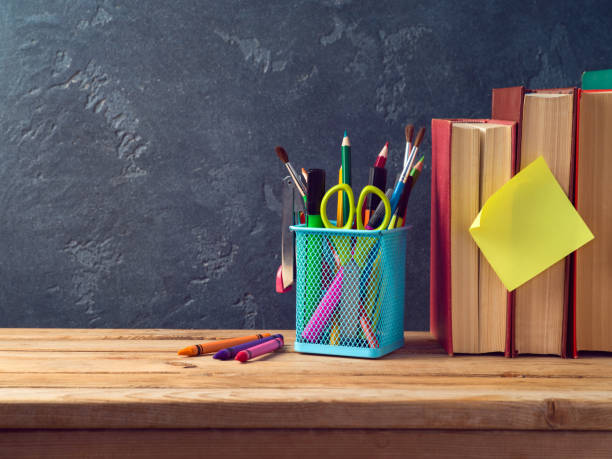 istock Back to school concept with pencils and old books 960937696