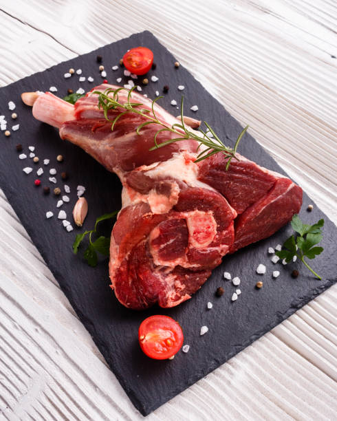 istock fresh lamb meat on a textured stone plate 960938710