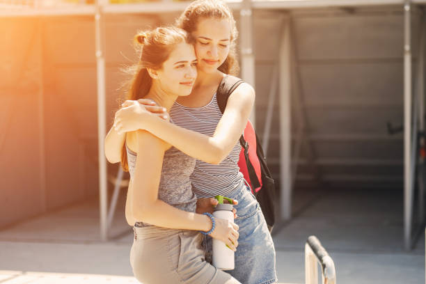 istock sisters in a city 960959396