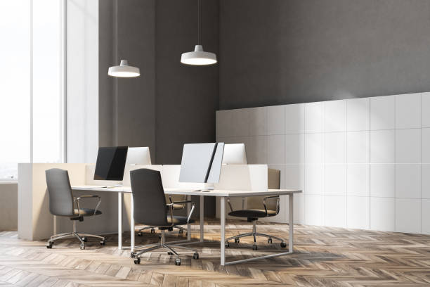 istock Corner of a dark gray wall office interior 960963202