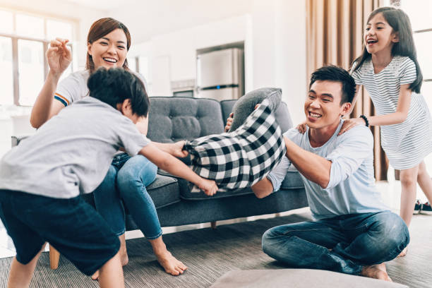 istock Family pillow fight 960963940