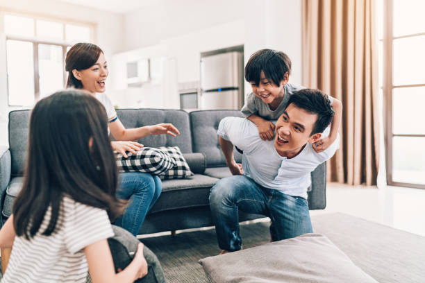istock Happy young family at home 960963956