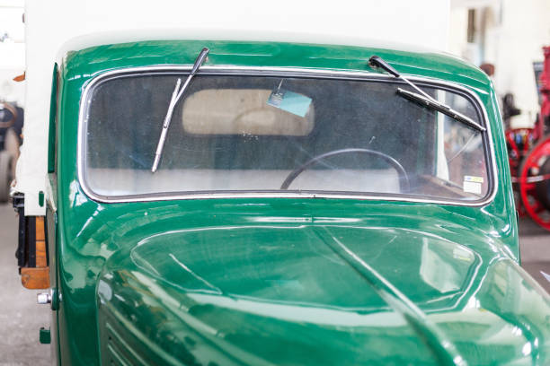 The headlight and indicators of a Morgan Plus Four.