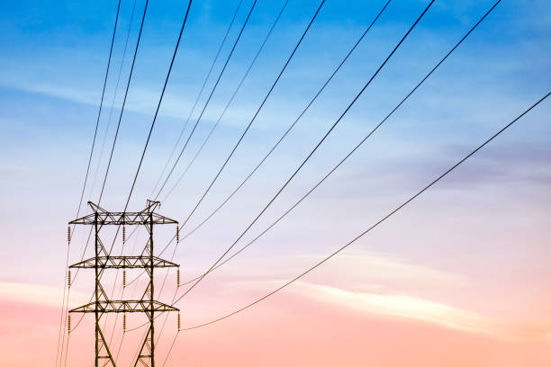 istock Electricity pylon and cables at sunset 960980934