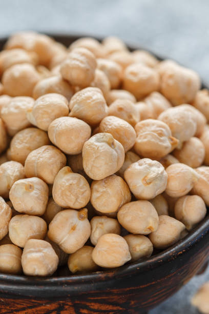 istock Raw Chickpeas in a brown clay bowl 960985246