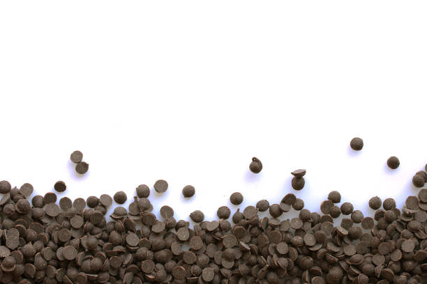 istock Bottom border of chocolate chips or sprinkles isolated on white 960989574