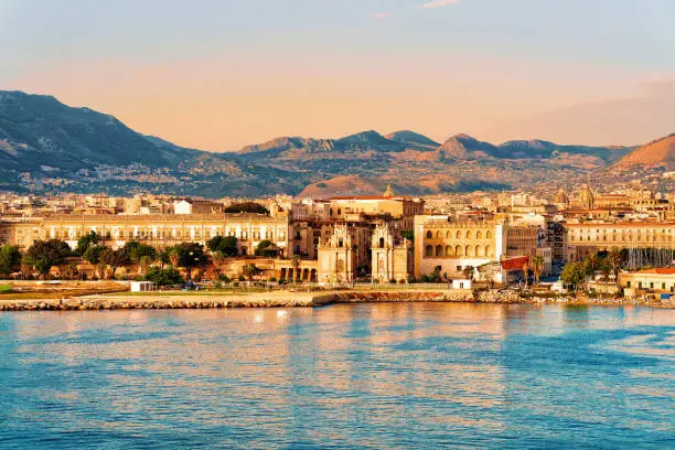 Sunrise at the Mediterranian sea and Palermo old city, Sicily island in Italy