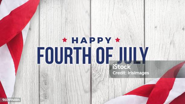 Happy Fourth Of July Text Over White Wood And American Flags Stock Photo - Download Image Now