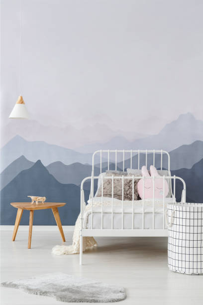 istock Mountains wallpaper in child bedroom 960998786
