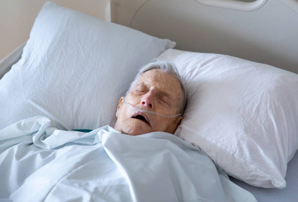 istock Elderly Man Resting in a Hospital Bed 960999858