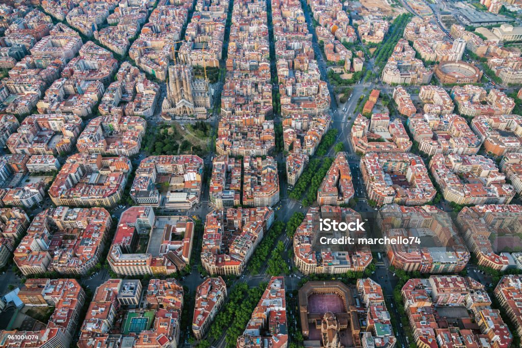 Aerial view of Barcelona Eixample residencial district with famous urban grid, Spain Aerial view of Barcelona Eixample residencial district with famous urban grid, Spain. Late afternoon light Barcelona - Spain Stock Photo