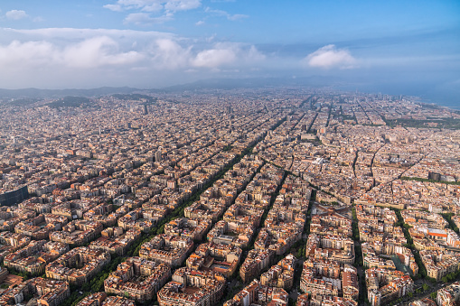 Barcelona aerial, wide angle view of the city skyline and urban grid, Spain