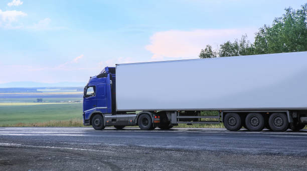 istock truck goes on the highway 961007334