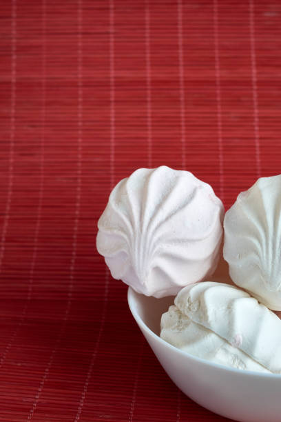 istock White zephyr marshmallow on porcelain plate 961007496