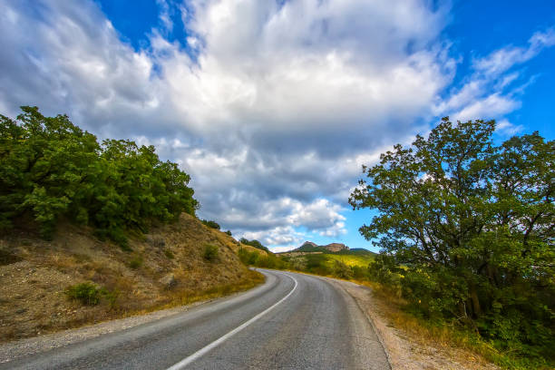 istock Mountain Landscape with Winding Road 961007876