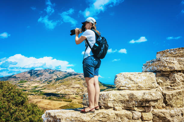 istock Woman looking at scenery in Segesta in Sicily island 961020566