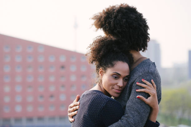 istock Young couple on a rooftop terrace at sunset 961035534