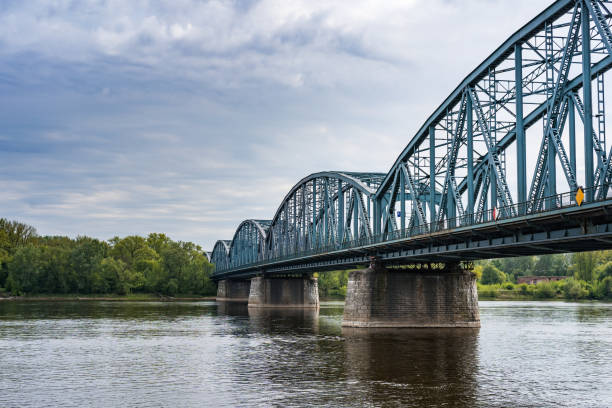 istock Truss road bridge over Vistula river in Torun, Poland. 961036344