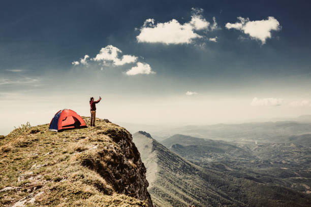 istock Man on top of a mountain 961043172
