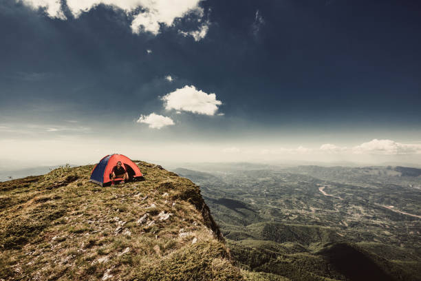 istock Man on top of a mountain 961043294