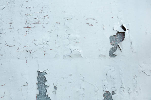 istock Texture of old cracked, peeling, shabby paint close-up. Background 961048360