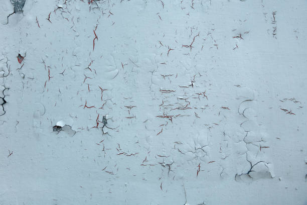 istock Texture of old cracked, peeling, shabby paint close-up. Background 961049324