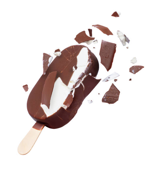 istock Chocolate ice-cream broken into pieces in the air on a white background 961050504