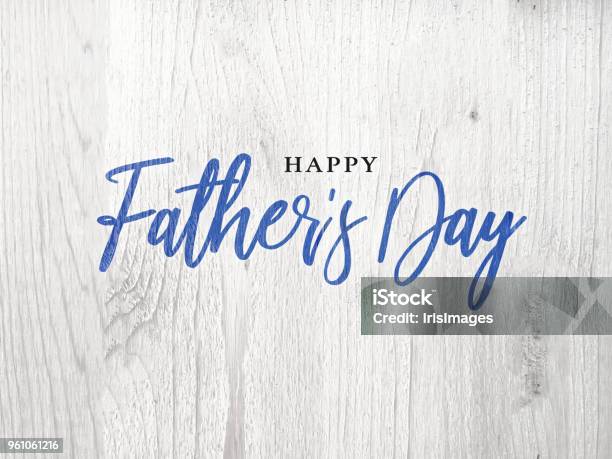 Happy Fathers Day Blue Calligraphy Script Over White Wood Stock Photo - Download Image Now