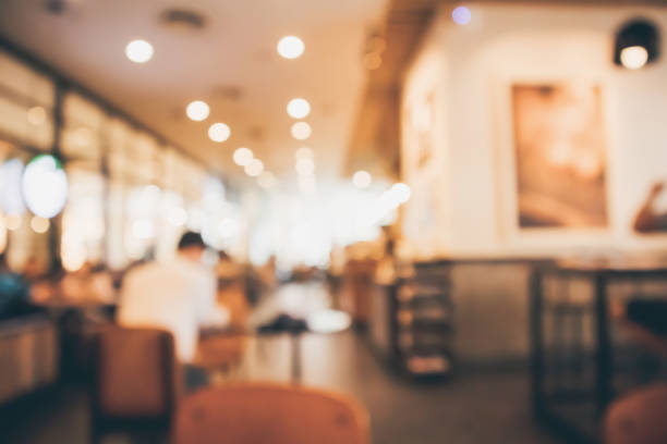 istock Restaurant cafe or coffee shop interior with people abstract defocused blur background 961077670
