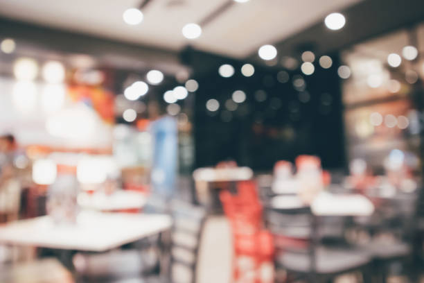 istock Restaurant cafe or coffee shop interior with people abstract defocused blur background 961077678