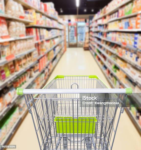 Supermarket Aisle With Empty Shopping Cart Business Concept Stock Photo - Download Image Now