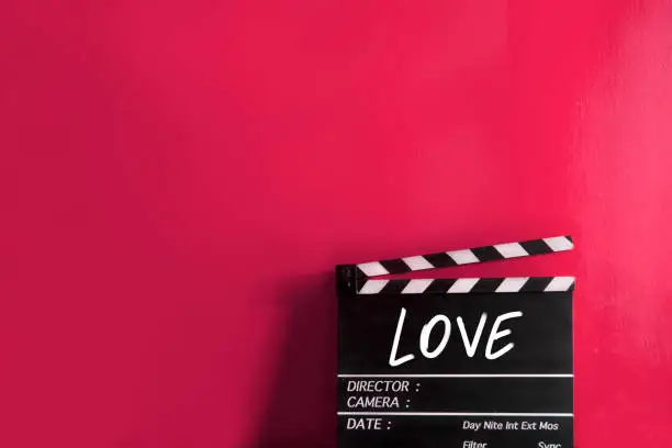 Photo of Love,text title on film Clapperboard