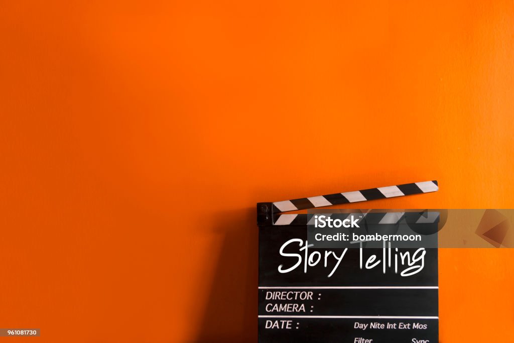 Story Telling,titolo testo su film Clapperboard - Foto stock royalty-free di Narrare Storie