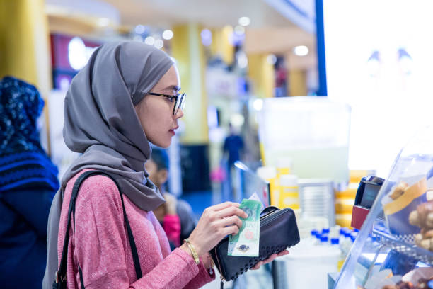 istock Women alone shopping at mall 961096290