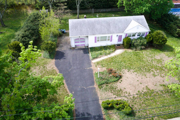 istock Neglected home and landscaping with dead lawn, aerial 961097278