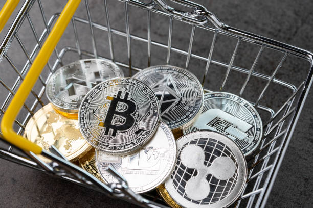 Cryptocurrency digital payment concept, various of silver and golden physical digital crypto money coins in shopping basket Cryptocurrency digital payment concept, various of silver and golden physical digital crypto money coins in shopping basket. altcoin photos stock pictures, royalty-free photos & images