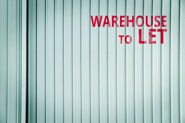 istock warehouse to let sign in metal wall background 961113276