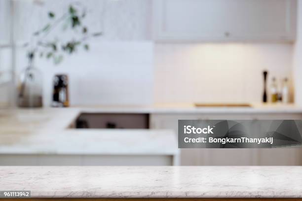 Empty White Marble Table Top And Kitchen Background For Food And Product Display Montage Stock Photo - Download Image Now