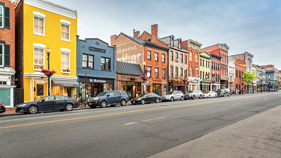 WASHINGTON DC - MAY, 6, 2018: Georgetown shopping district along M Street. M street hosts a large variety of shops from indie to home design, high-end boutiques and national and international retail.