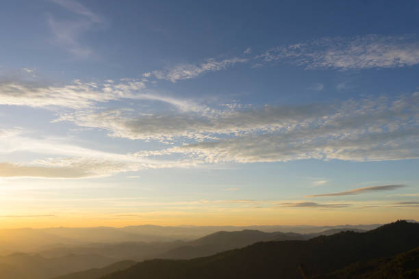 istock Panoramic scenery of mountains at sunset 961122846