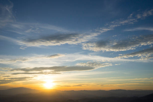 istock Panoramic scenery of mountains at sunset 961122848