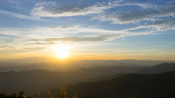 istock Panoramic scenery of mountains at sunset 961122850