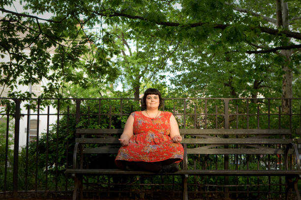 istock Brown-haired woman with bangs in park 961127084