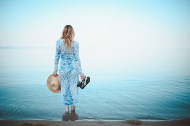 istock Young woman enjoying the view during her vacation in Greece 961128620