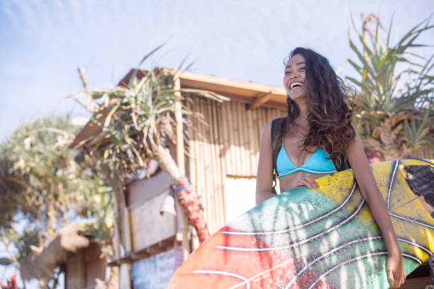istock Beautiful woman surfer 961154310