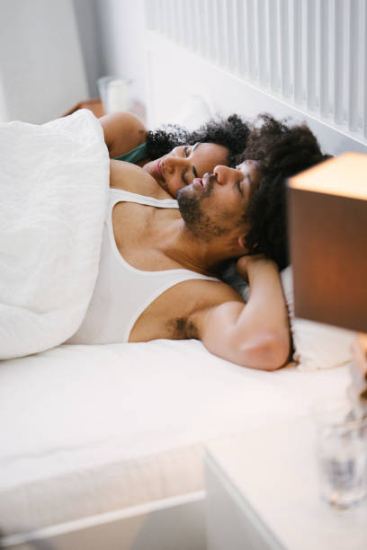istock Young beautiful couple in bed 961159440