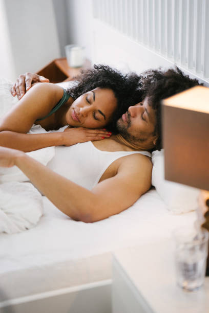 istock Young beautiful couple in bed 961160010