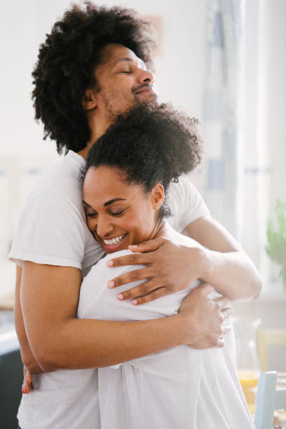 istock Young beautiful couple in the kitchen 961162626