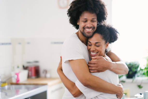istock Young beautiful couple in the kitchen 961163526